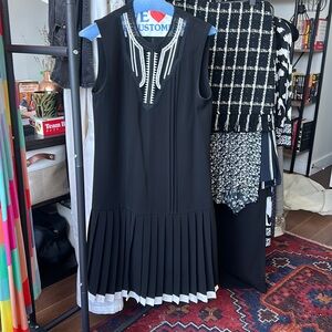 Yigal Azrouel black mini dress with pleated skirt, size 6